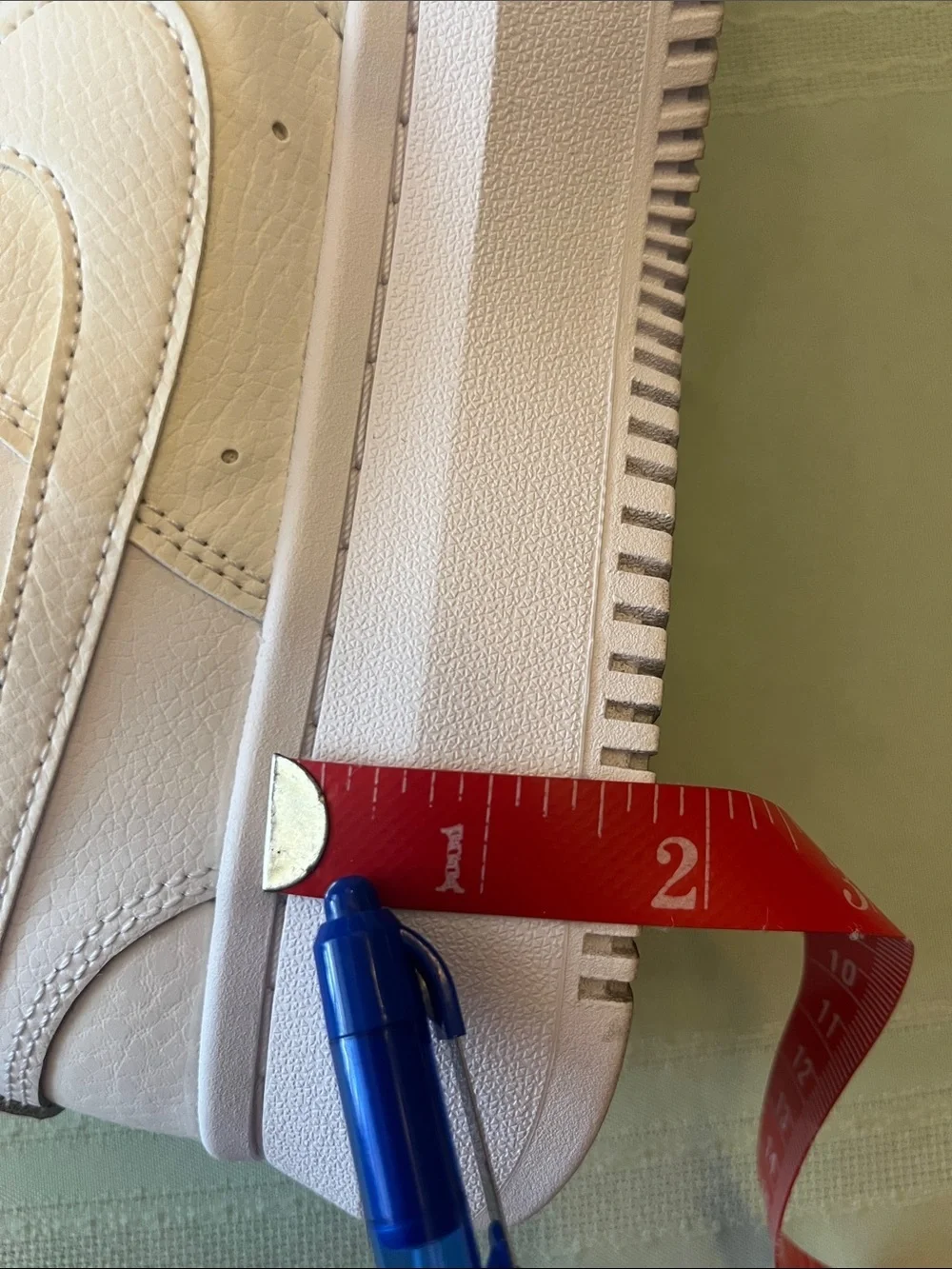 Nike Men’s White Low-Top Sneakers with Perforated Toe